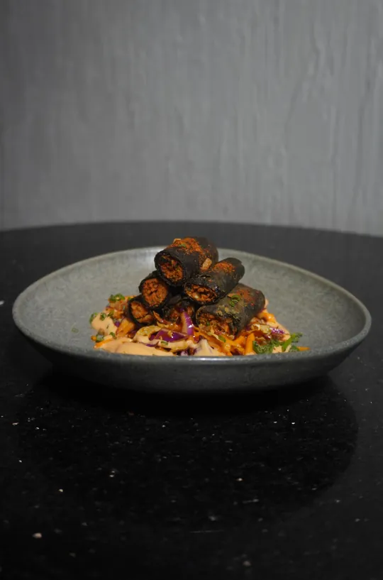 Chargrilled skewers with slaw on an oval platter