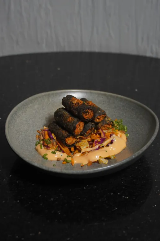 Chargrilled skewers over spiced puree