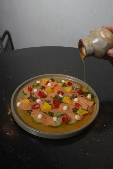Salmon crudo with citrus and cherry tomato