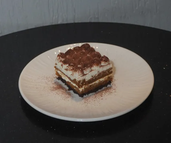 Classic tiramisu dusted with cocoa